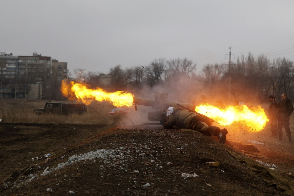 A volunteer of the separatist self-proclaimed Donetsk People's Republican guard fires a Konkurs wire-guided anti-tank missile  during shooting training in Donetsk